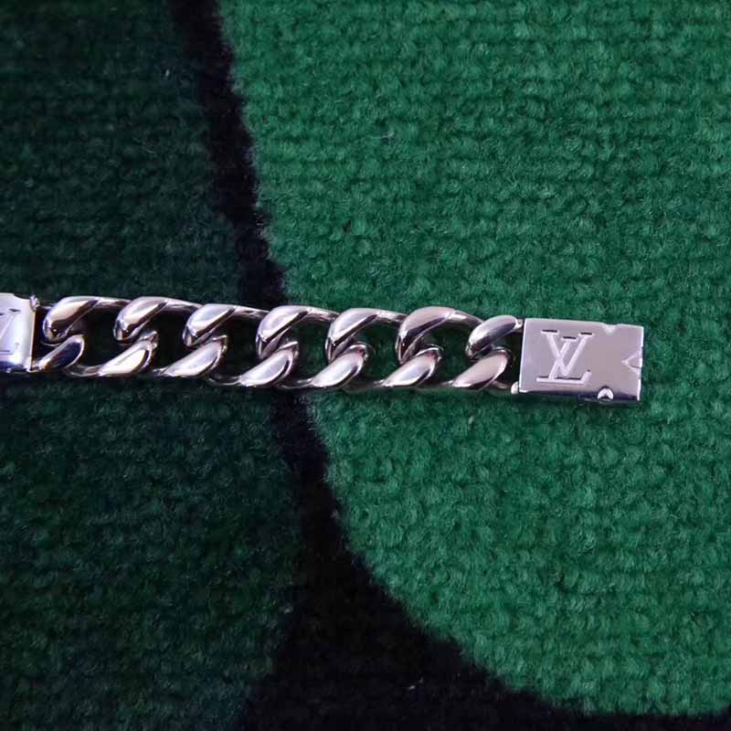 Louis Vuitton Silver Carved Monogram Bracelet  - DesignerGu