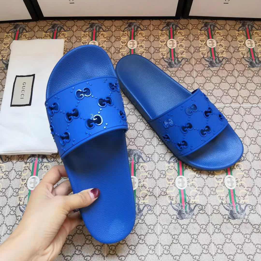 Gucci Rubber GG Slide Sandal In Blue - DesignerGu