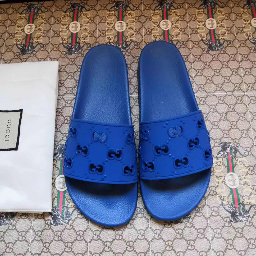 Gucci Rubber GG Slide Sandal In Blue - DesignerGu