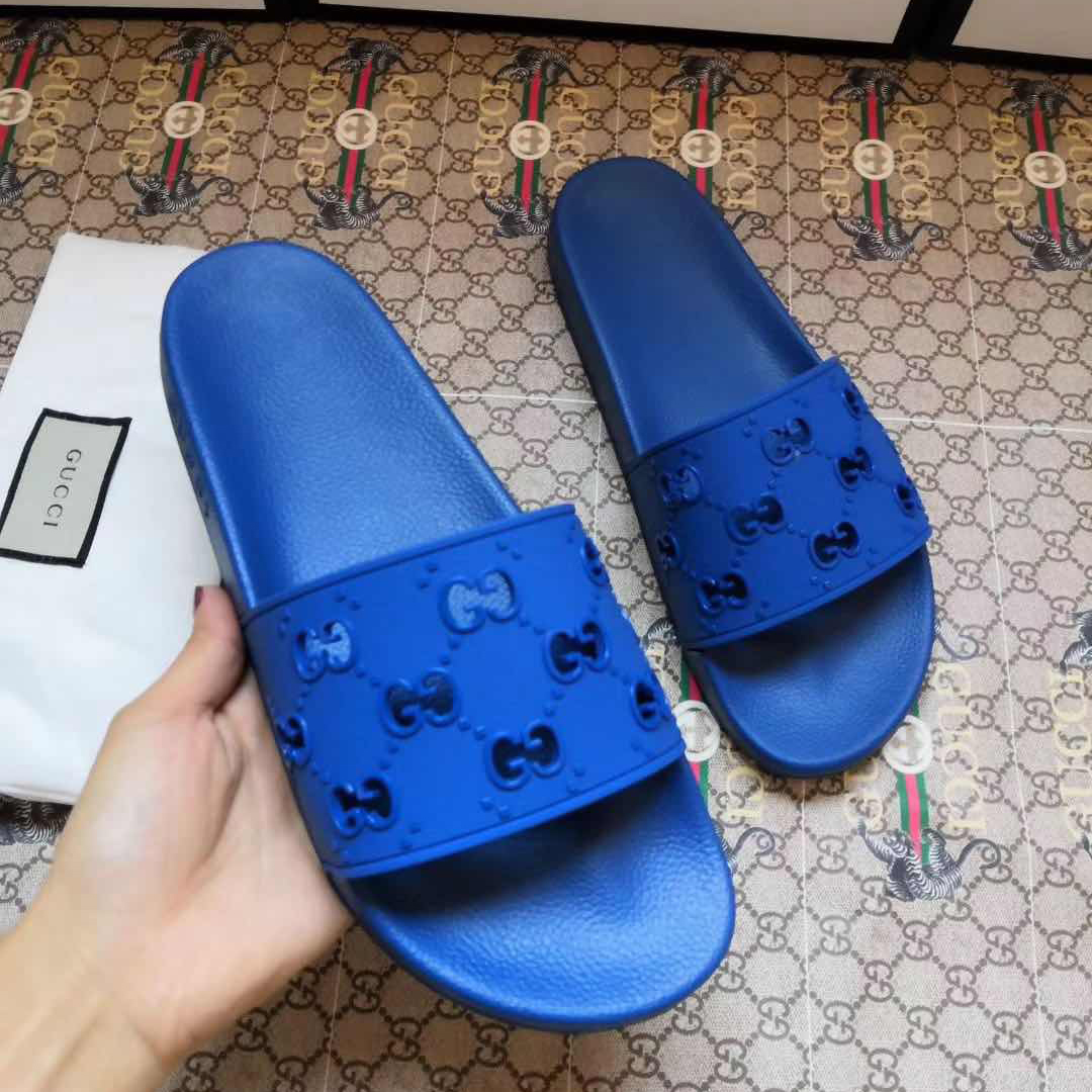 Gucci Rubber GG Slide Sandal In Blue - DesignerGu