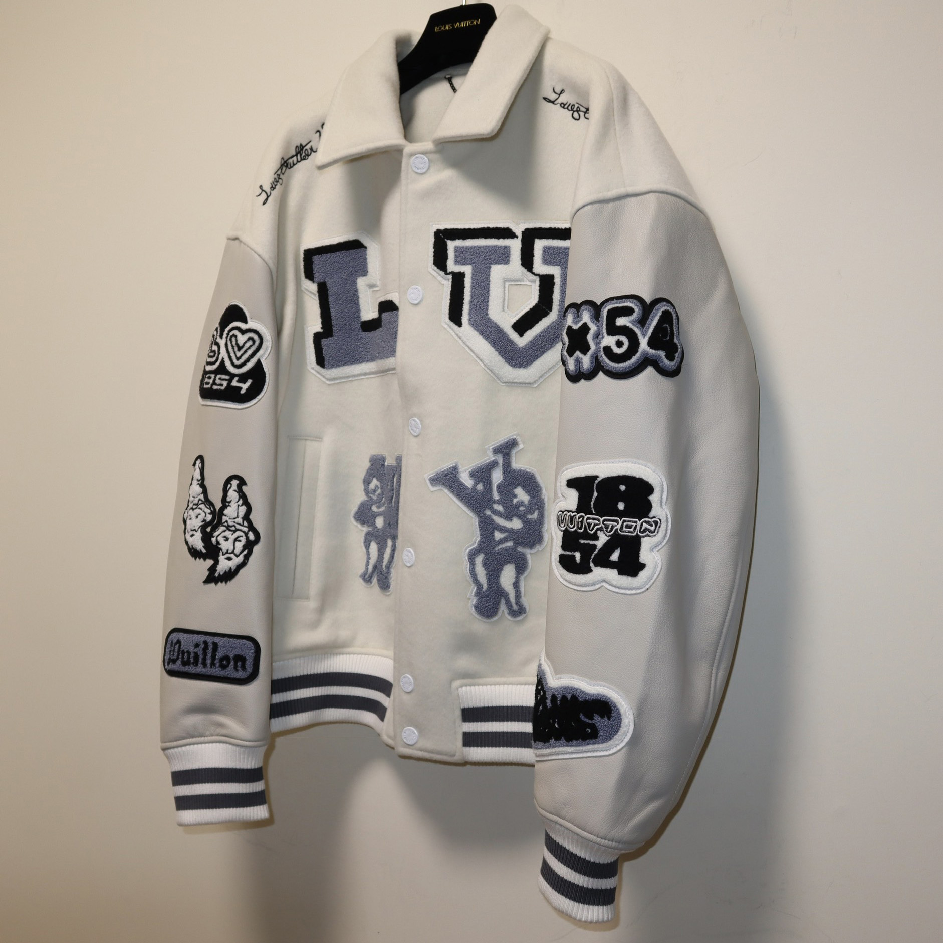 Louis Vuitton Multi-Patches Mixed Leather Varsity Blouson  1AAGKF - DesignerGu