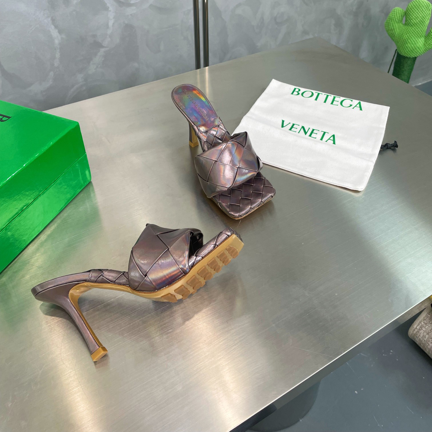 Bottega Veneta  Intreccio Metallized Leather Mules - DesignerGu