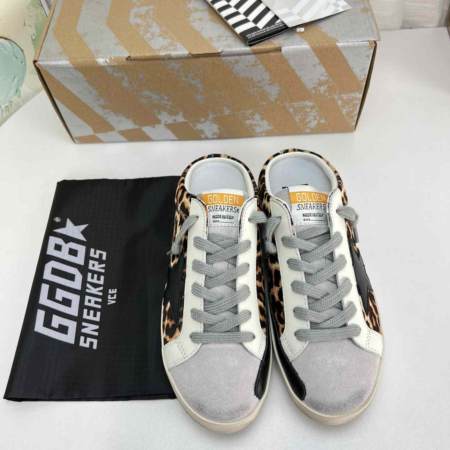 Golden Goose Super-Star Sabots In Leopard-Print Pony Skin With Black Leather Star And Ice-Gray Suede Tongue - DesignerGu