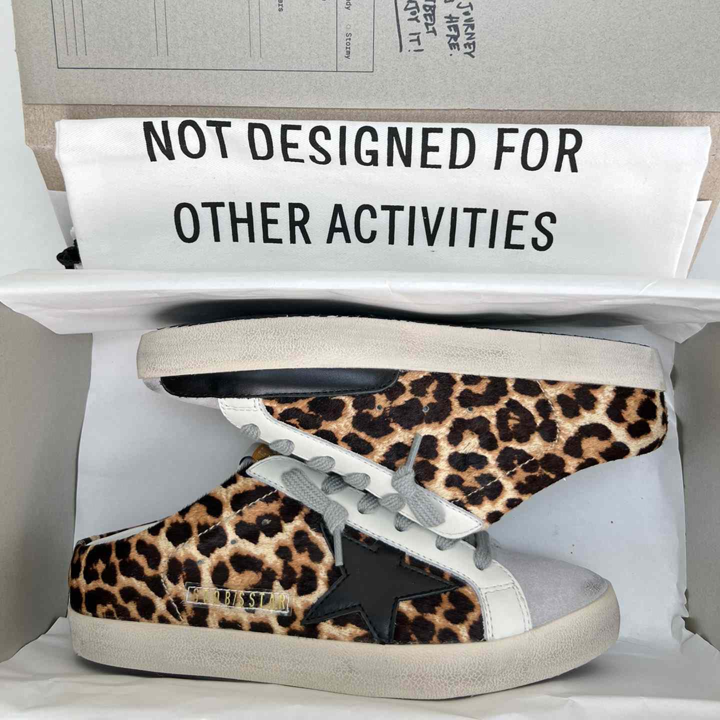 Golden Goose Super-Star Sabots In Leopard-Print Pony Skin With Black Leather Star And Ice-Gray Suede Tongue - DesignerGu