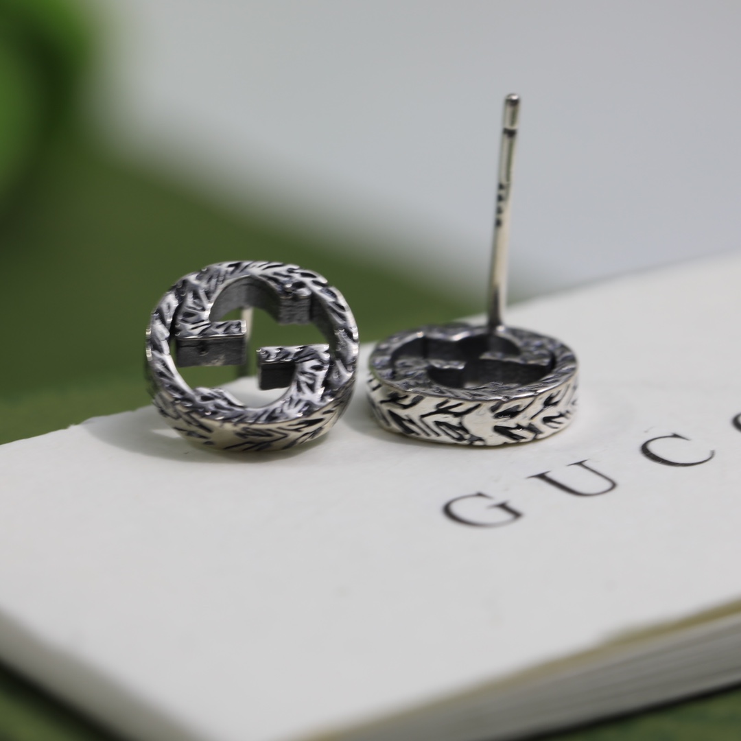 Gucci Interlocking G earrings In Silver - DesignerGu