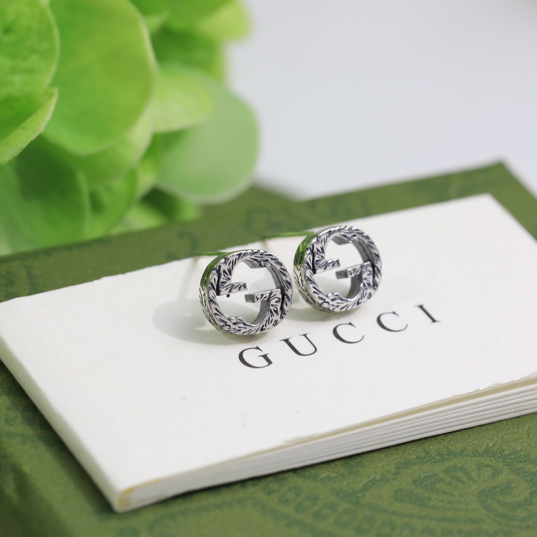 Gucci Interlocking G earrings In Silver - DesignerGu