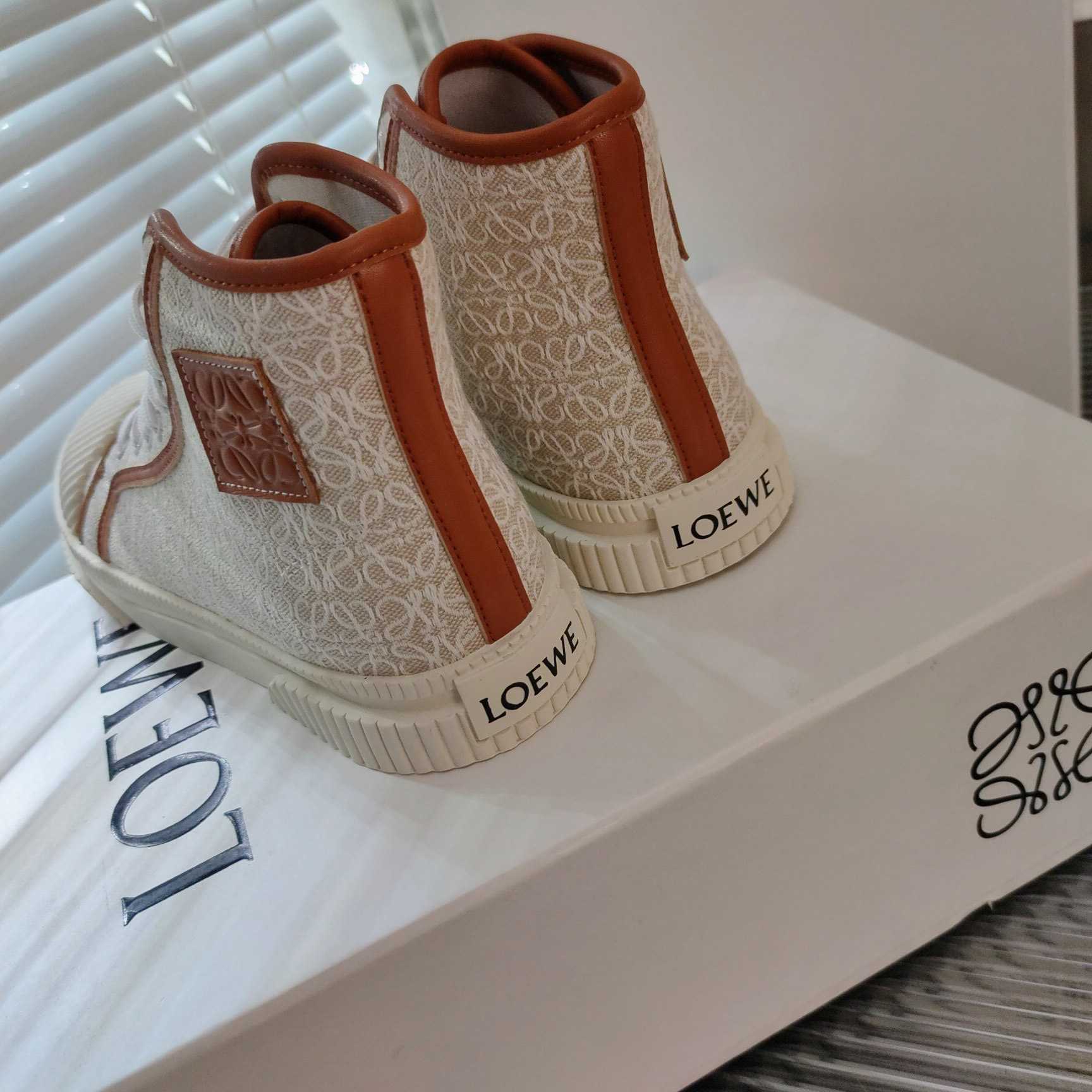 Loewe Anagram High Top Sneaker In Canvas - DesignerGu