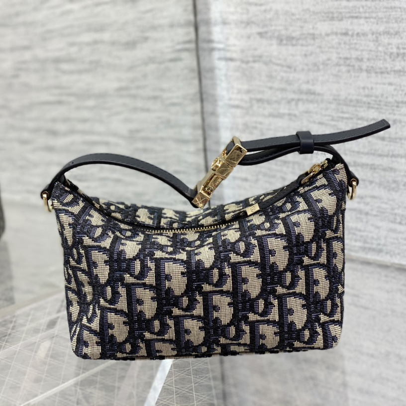 Dior Small Diortravel Nomad Pouch - DesignerGu