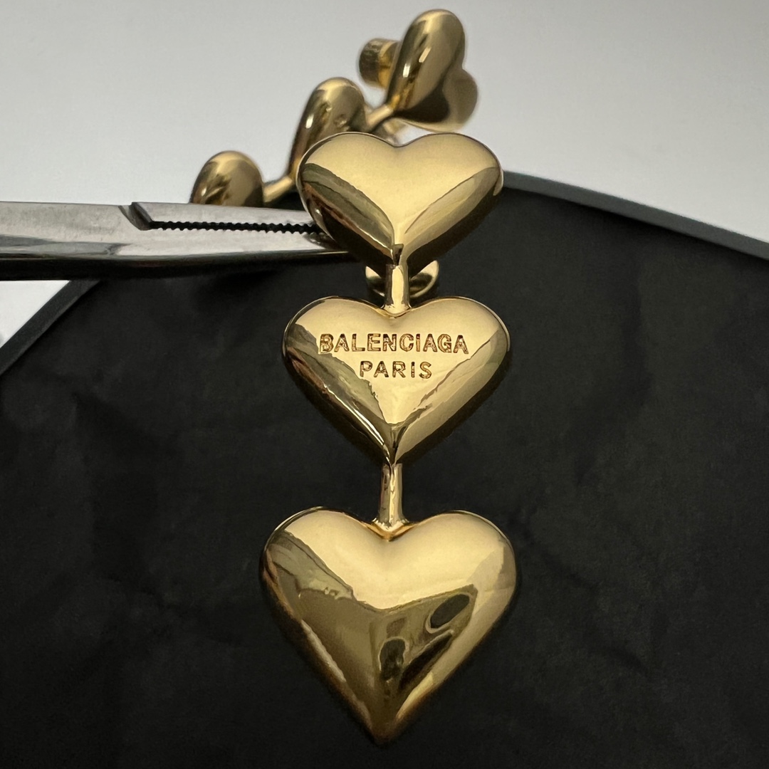 Balenciaga Women's Heart Earrings In Gold - DesignerGu