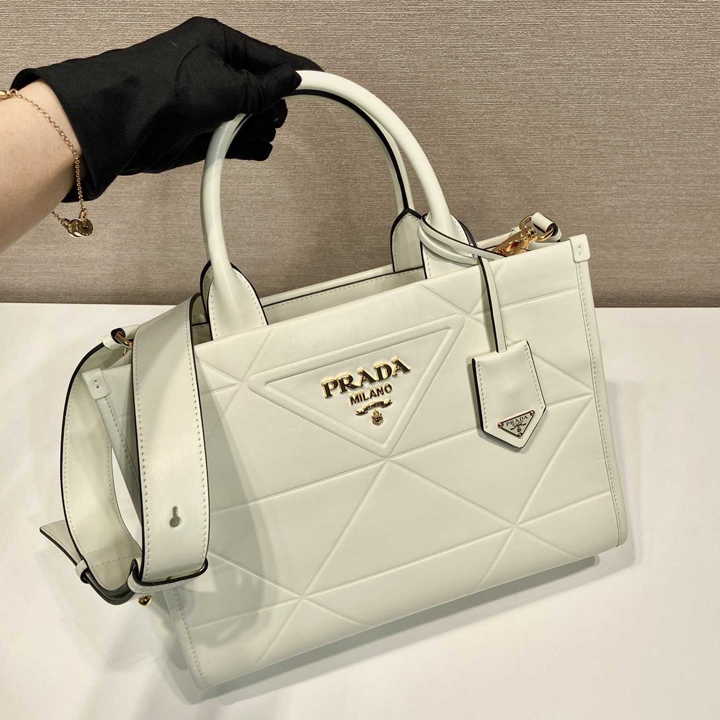 Prada Small Leather Prada Symbole Bag With Topstitching - DesignerGu