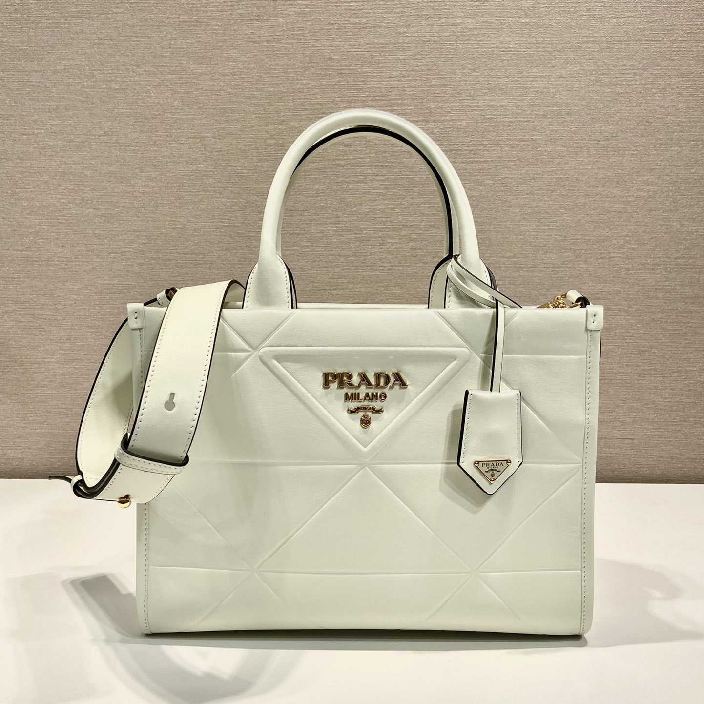 Prada Small Leather Prada Symbole Bag With Topstitching - DesignerGu