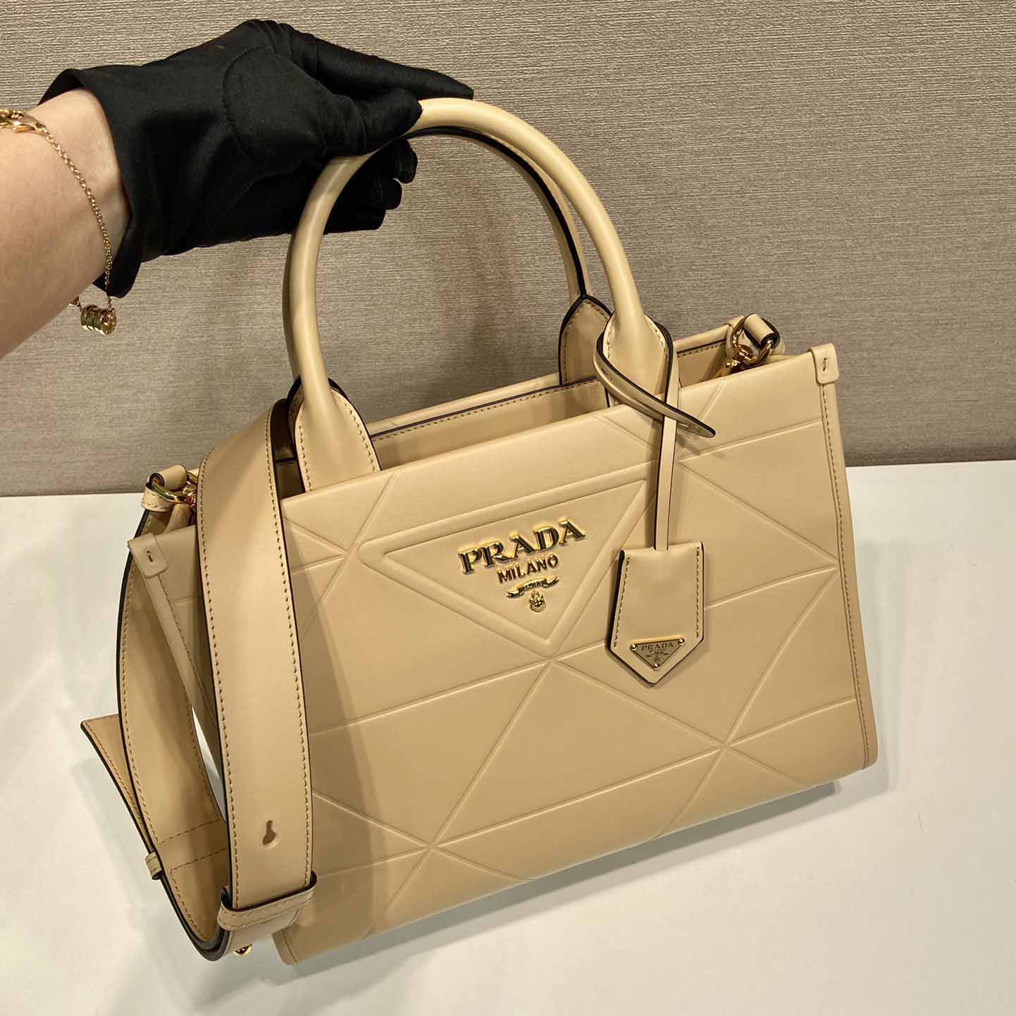 Prada Small Leather Prada Symbole Bag With Topstitching - DesignerGu