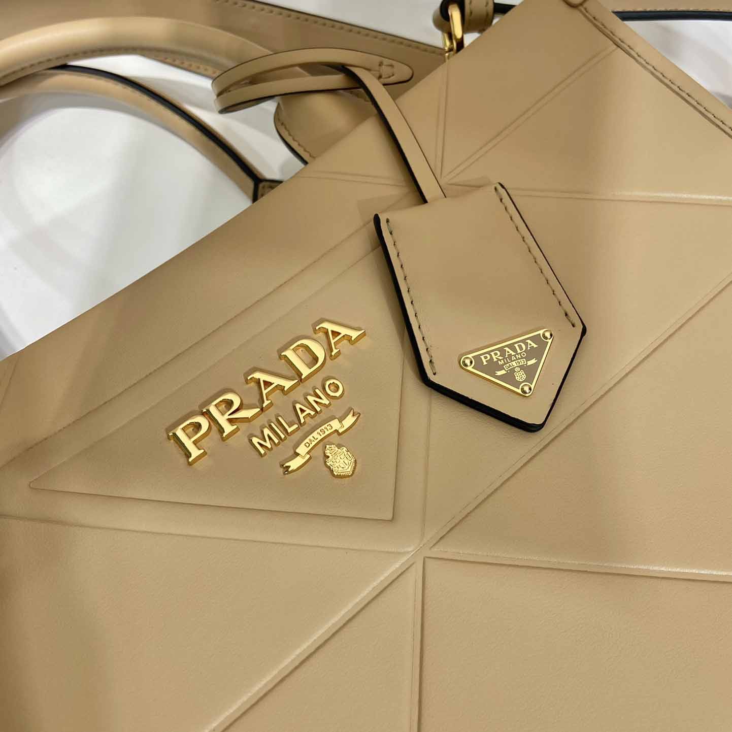 Prada Small Leather Prada Symbole Bag With Topstitching - DesignerGu