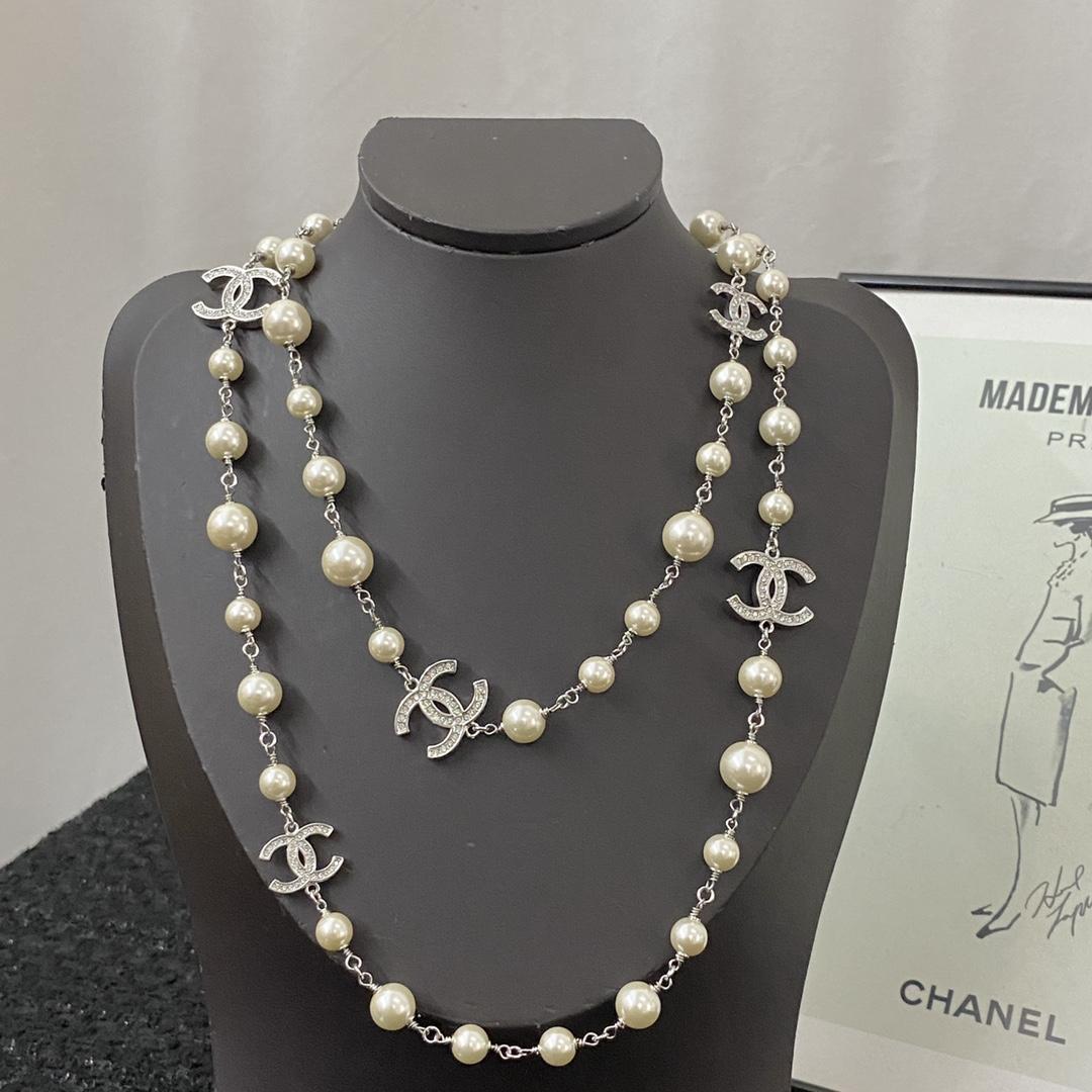 Chanel Pearl Necklace Sautoir with CC Logos & Crystals - DesignerGu