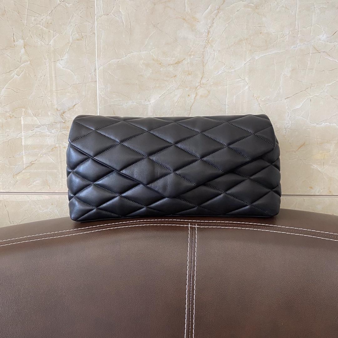 Saint Laurent Sade Puffer Quilted Leather Clutch In Black  - DesignerGu