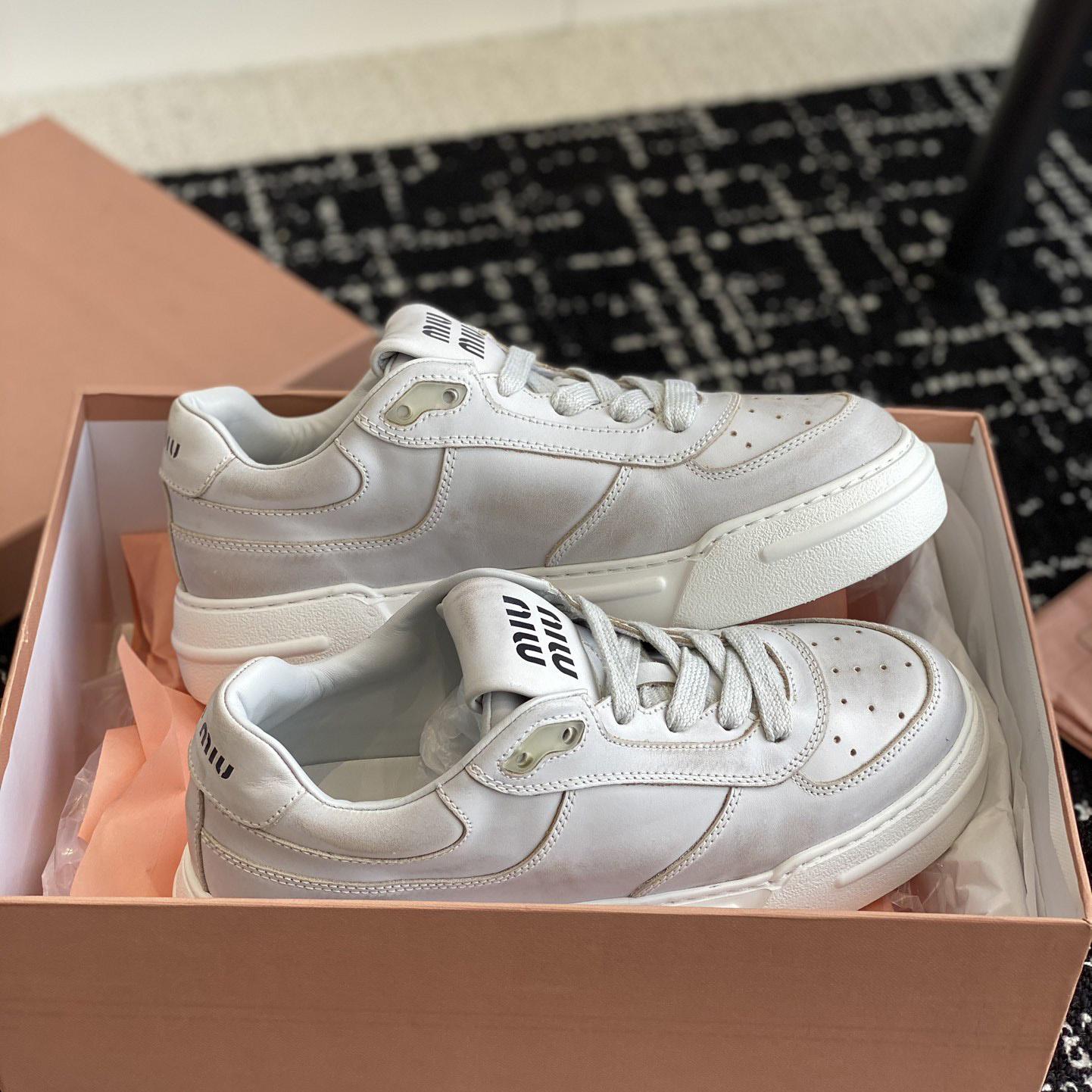 Miu Miu Bleached Leather Sneakers - DesignerGu