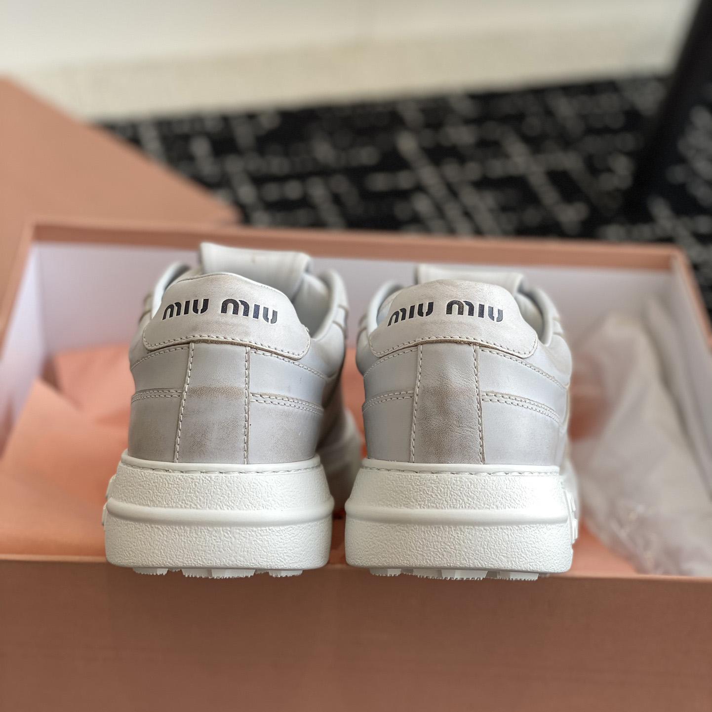 Miu Miu Bleached Leather Sneakers - DesignerGu