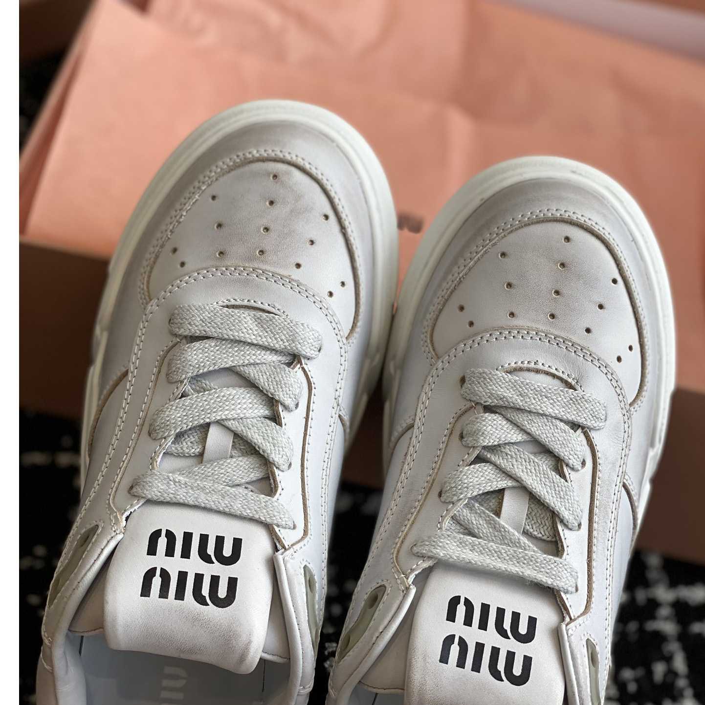 Miu Miu Bleached Leather Sneakers - DesignerGu