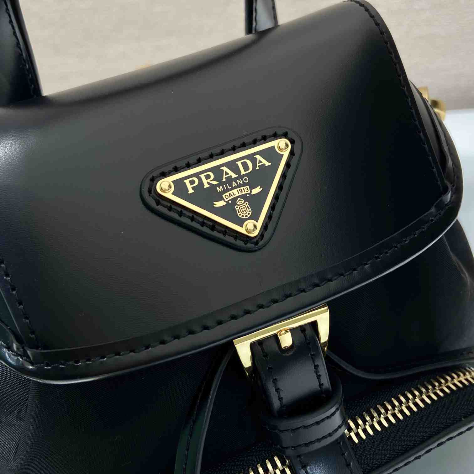 Prada Small Re-Nylon And Brushed Leather Backpack - DesignerGu