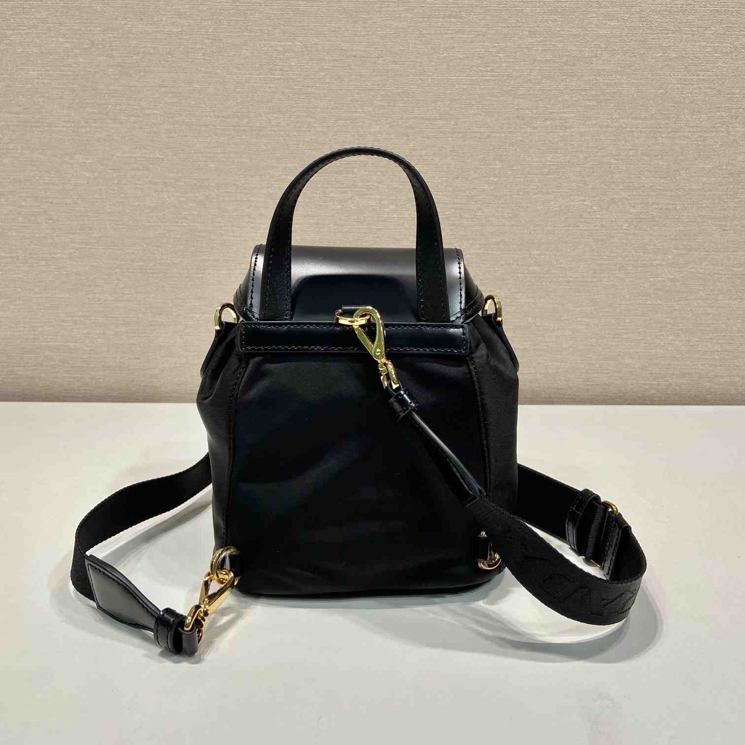 Prada Small Re-Nylon And Brushed Leather Backpack - DesignerGu