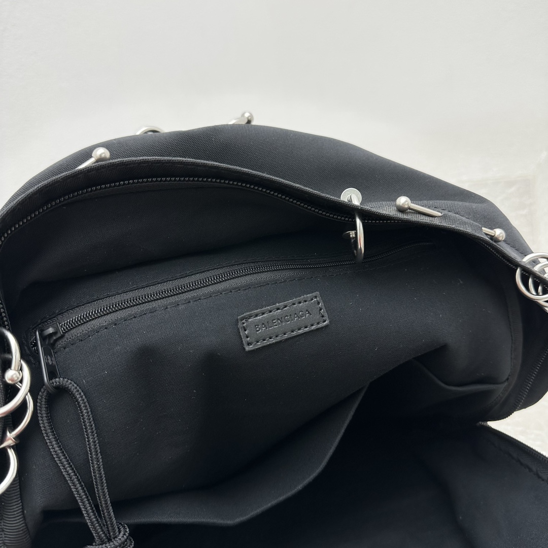 Balenciaga Explorer Backpack With Piercings In Black - DesignerGu