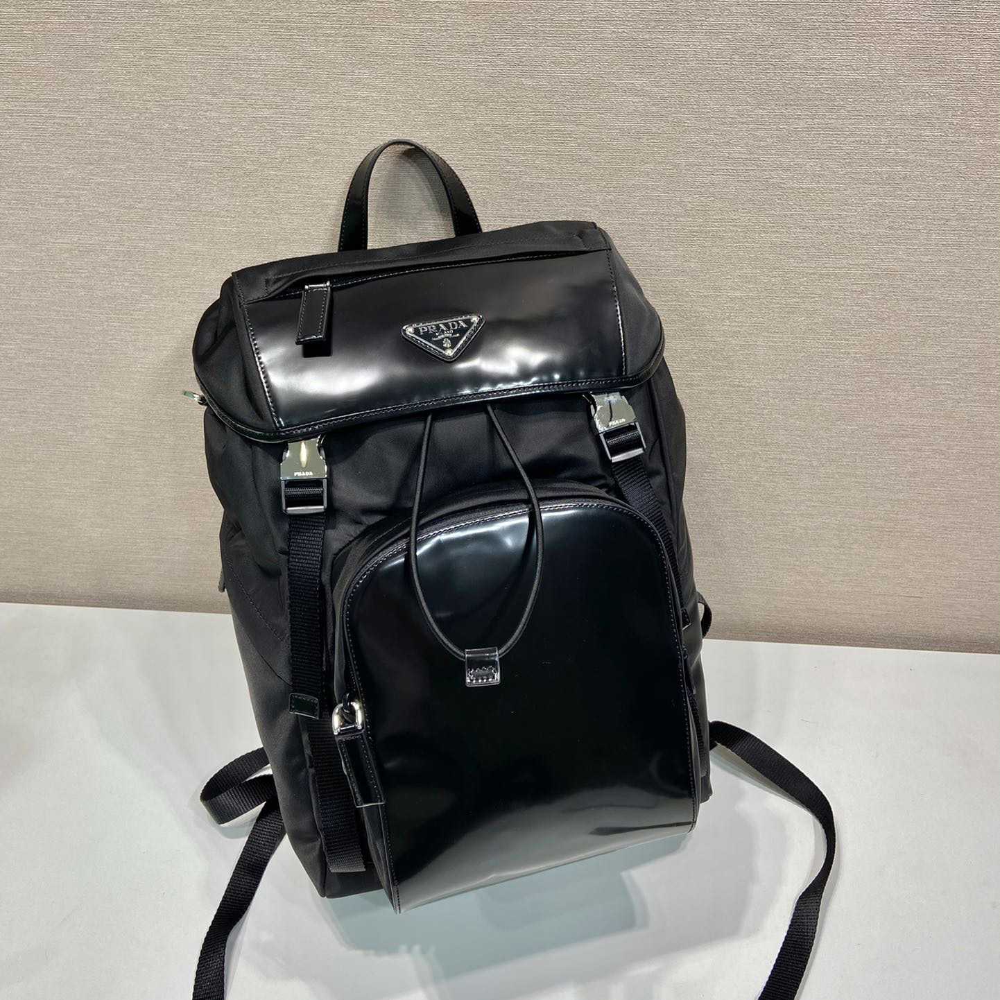 Prada Re-Nylon And Brushed Leather Backpack - DesignerGu