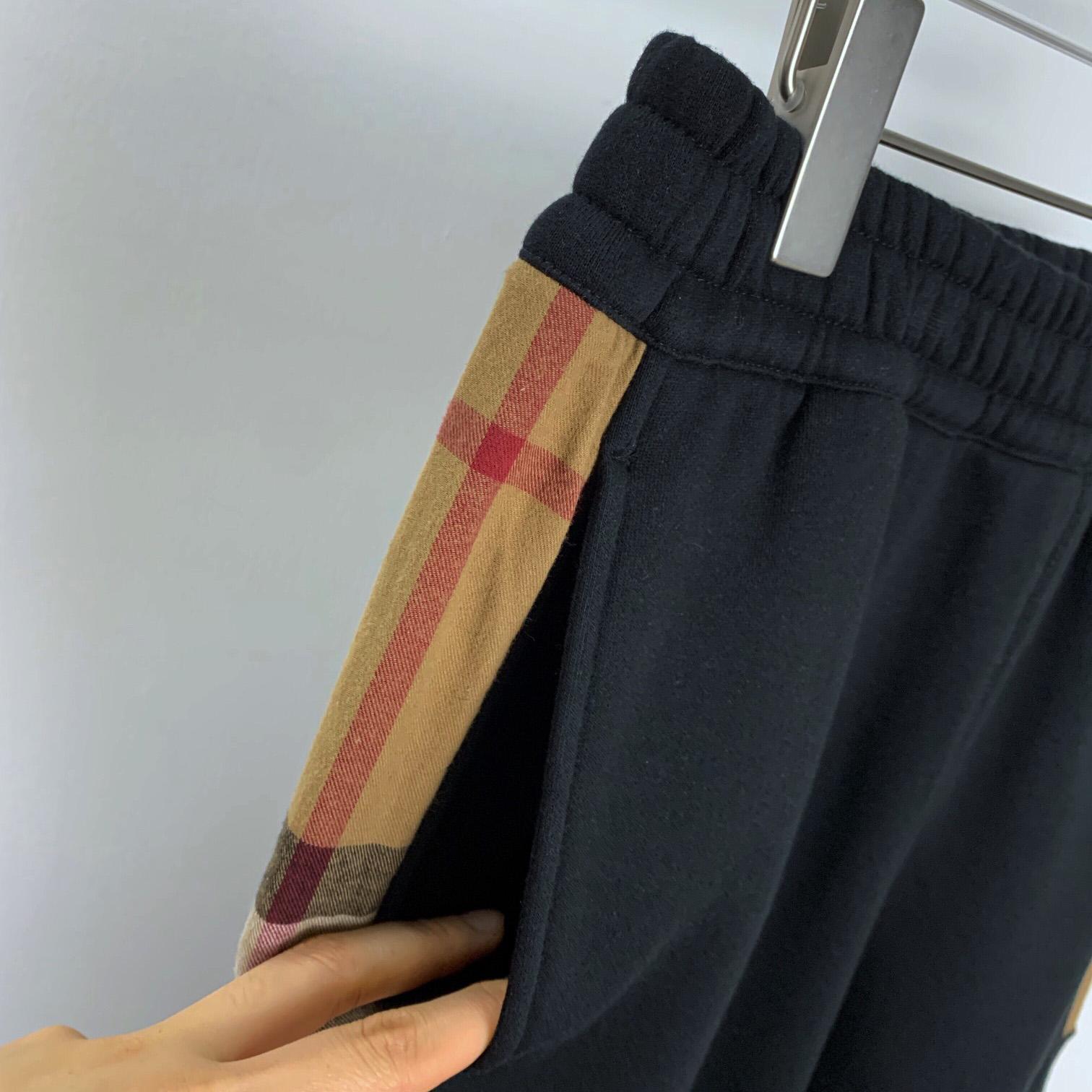 Burberry Check Panel Jogging Trousers In Grey - DesignerGu