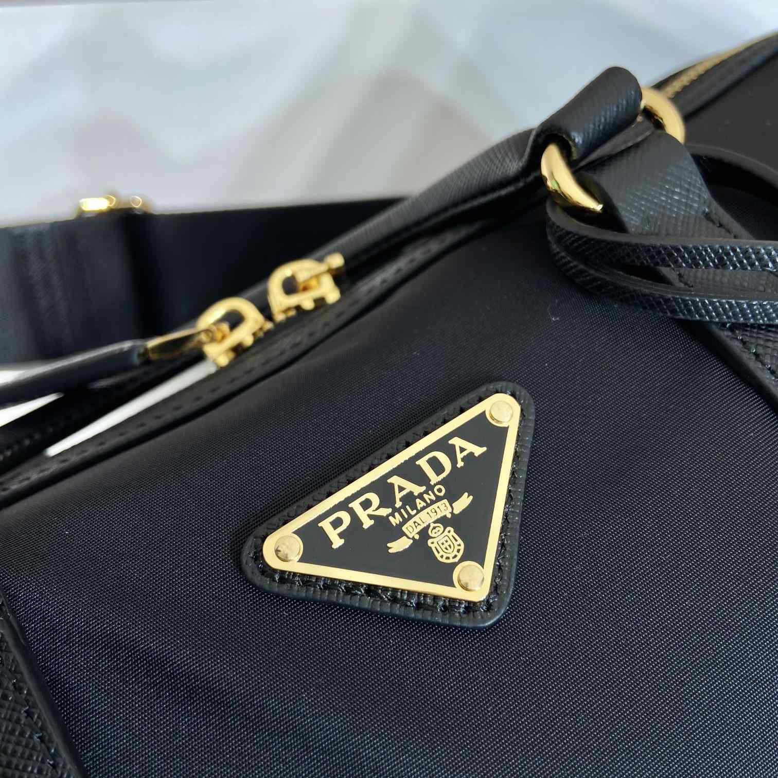 Prada Re-Edition 1978 Medium Re-Nylon And Saffiano Leather Top-handle Bag - DesignerGu