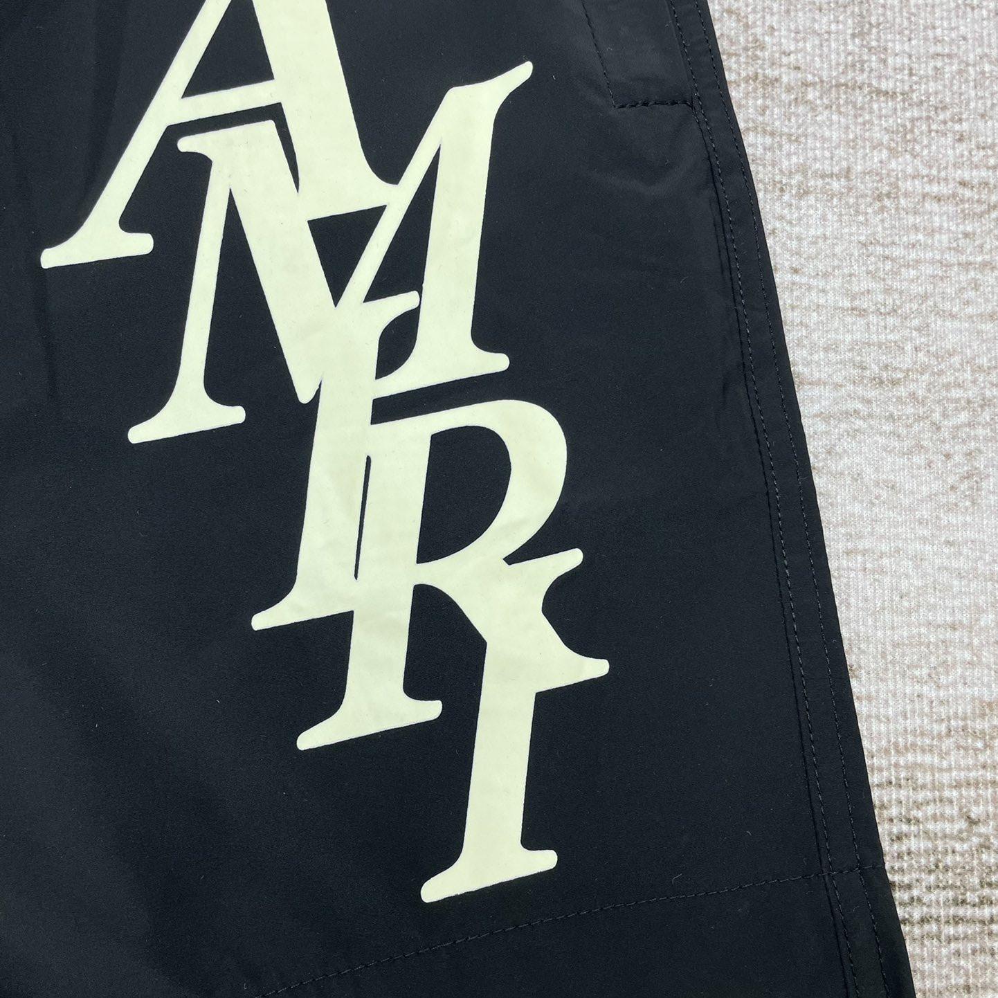 Amiri Stack Logo Swim Shorts       x777 - DesignerGu