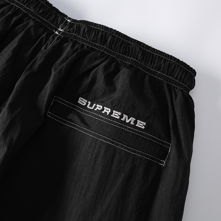 Supreme x Nike Ripstop Track Pant - DesignerGu