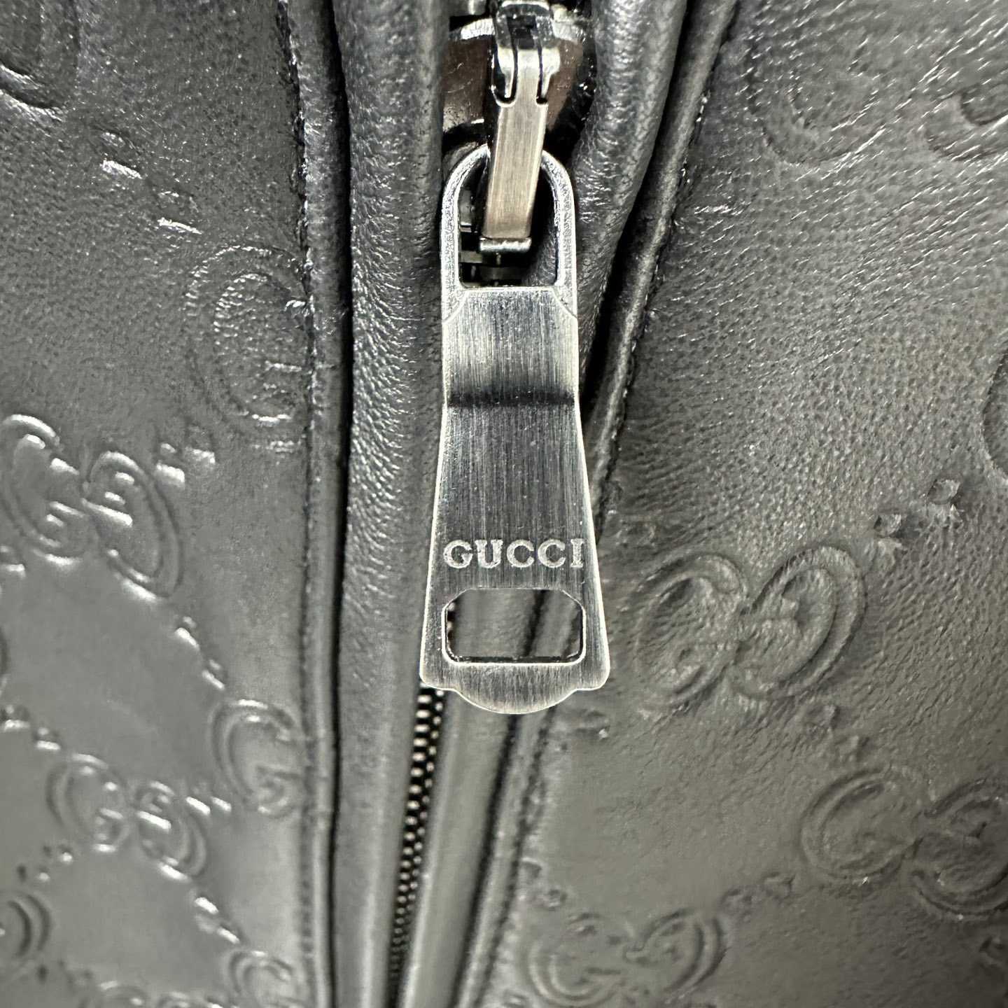 Gucci Embossed GG Leather Bomber Jacket  - DesignerGu