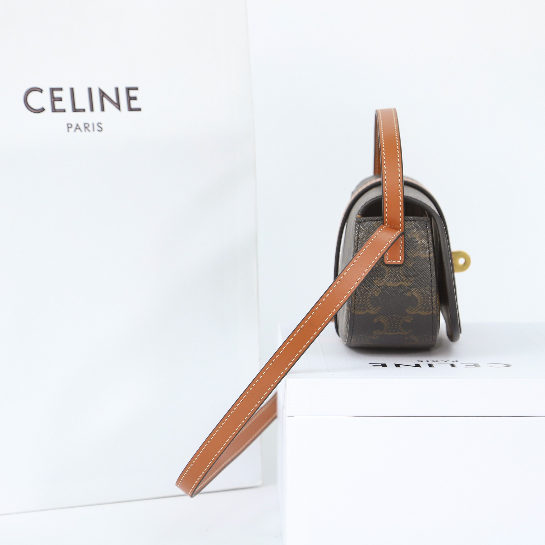 Celine Clutch On Strap Tabou In Triomphe Canvas And Calfskin - DesignerGu