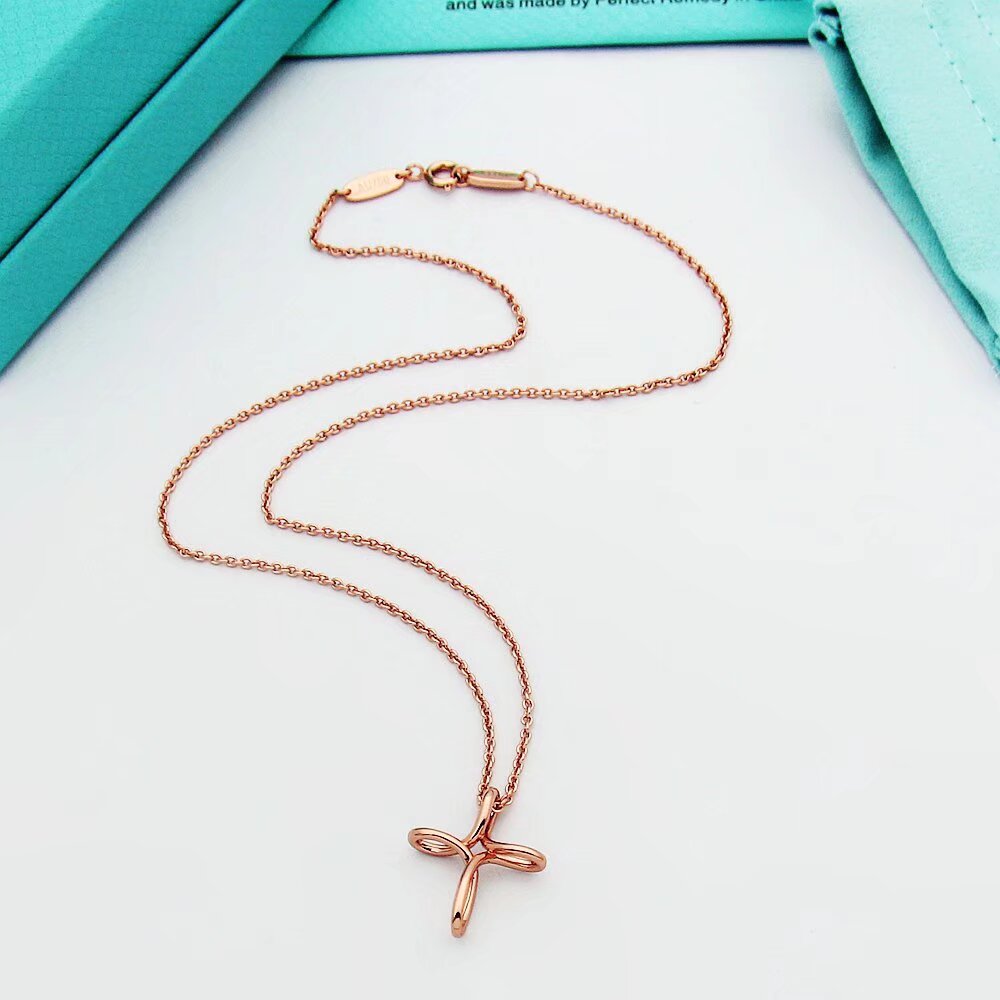 Tiffany & Co. Infinity Cross Pendant - DesignerGu