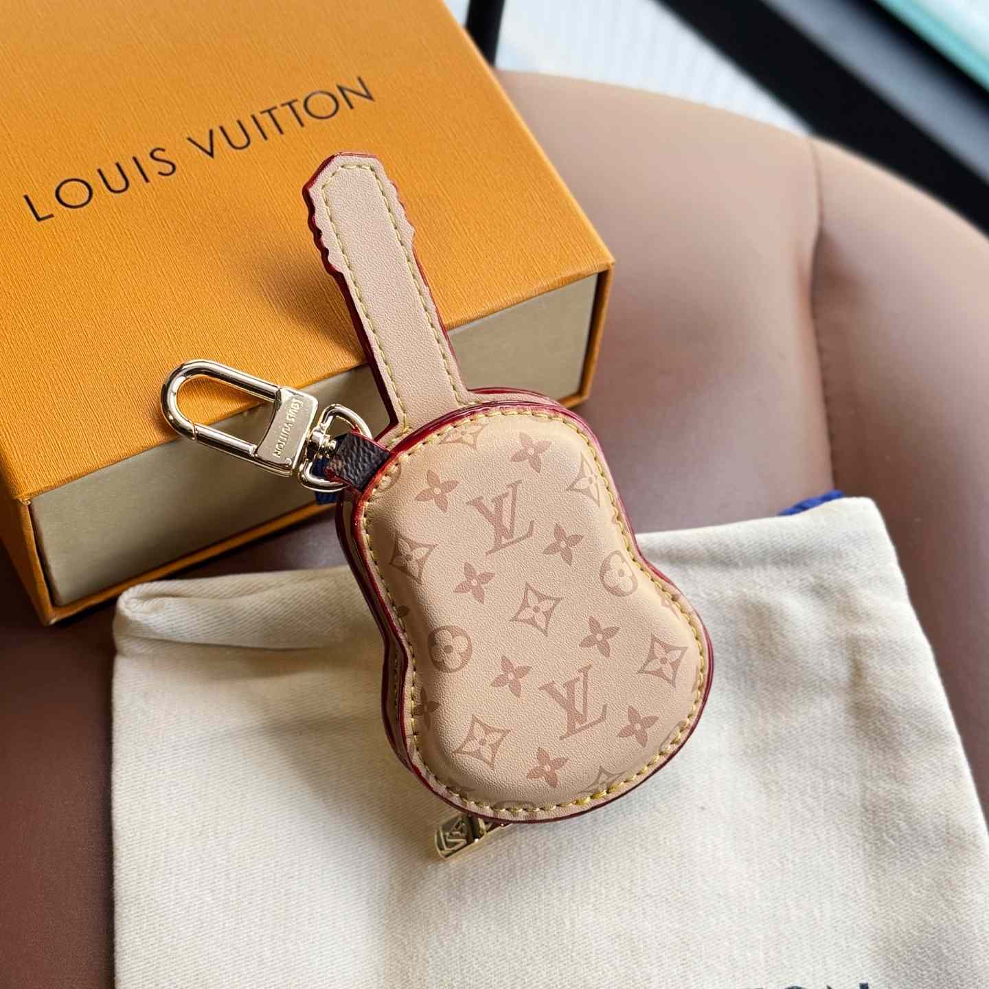 Louis Vuitton Guitar Pouch Bag Charm   M02032 - DesignerGu