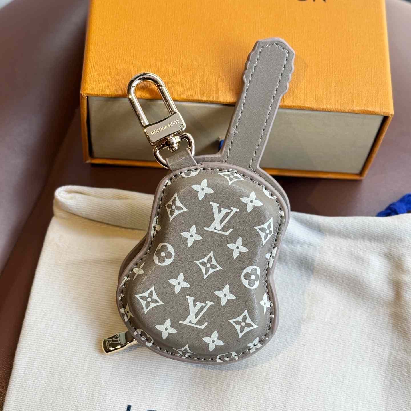 Louis Vuitton Guitar Pouch Bag Charm   M02032 - DesignerGu