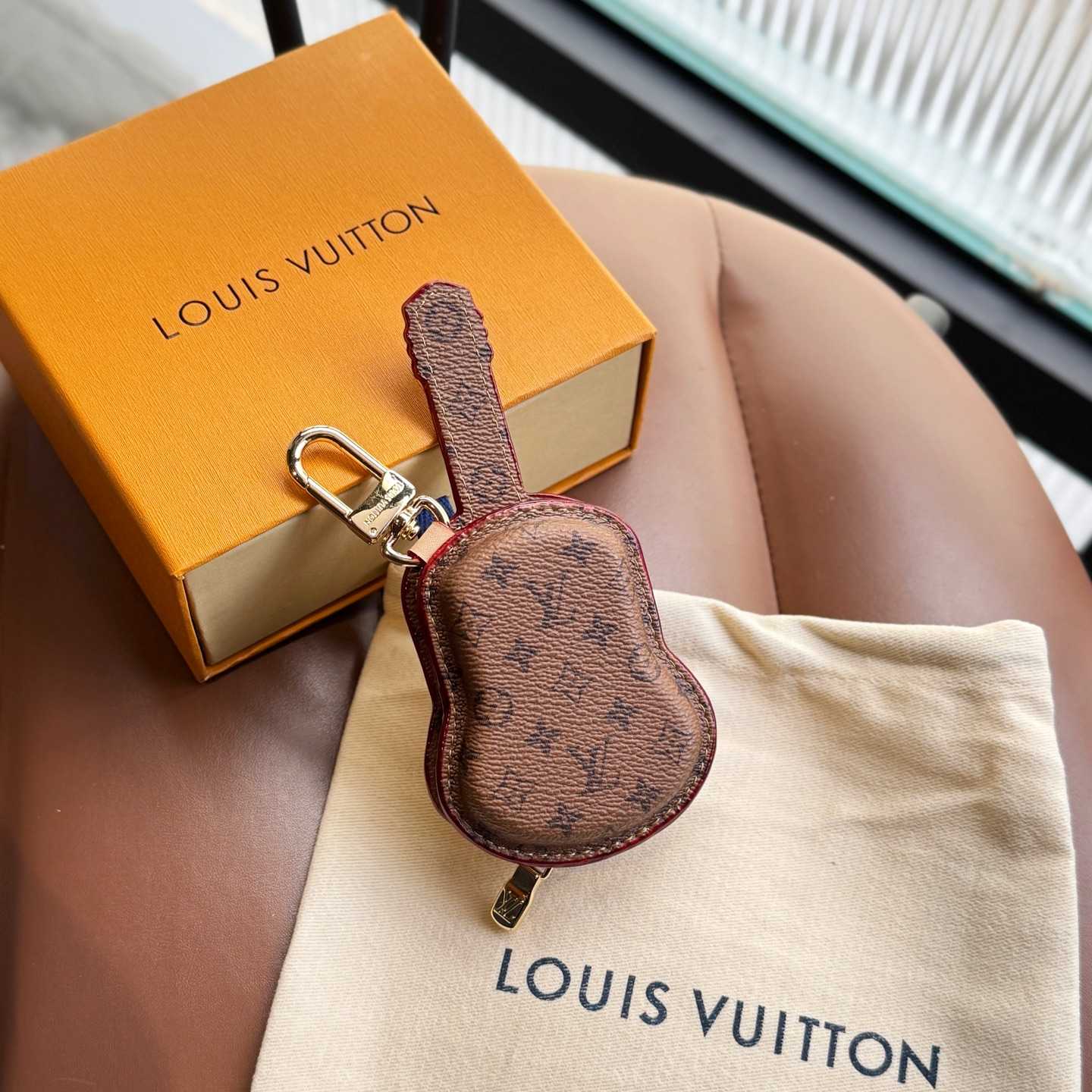 Louis Vuitton Guitar Pouch Bag Charm   M02032 - DesignerGu