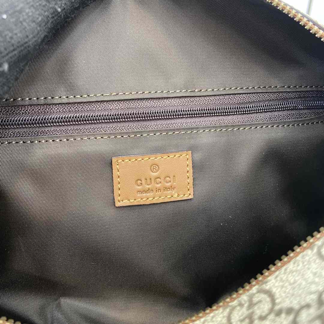 Gucci GG Emblem Medium Toiletry Case - DesignerGu