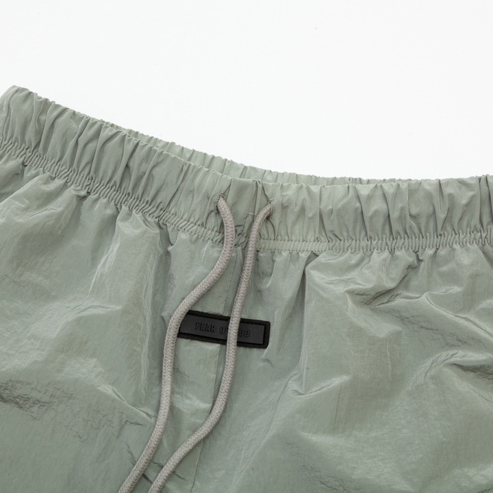 Fear of God Essentials Crinkle Nylon Track Pants - DesignerGu