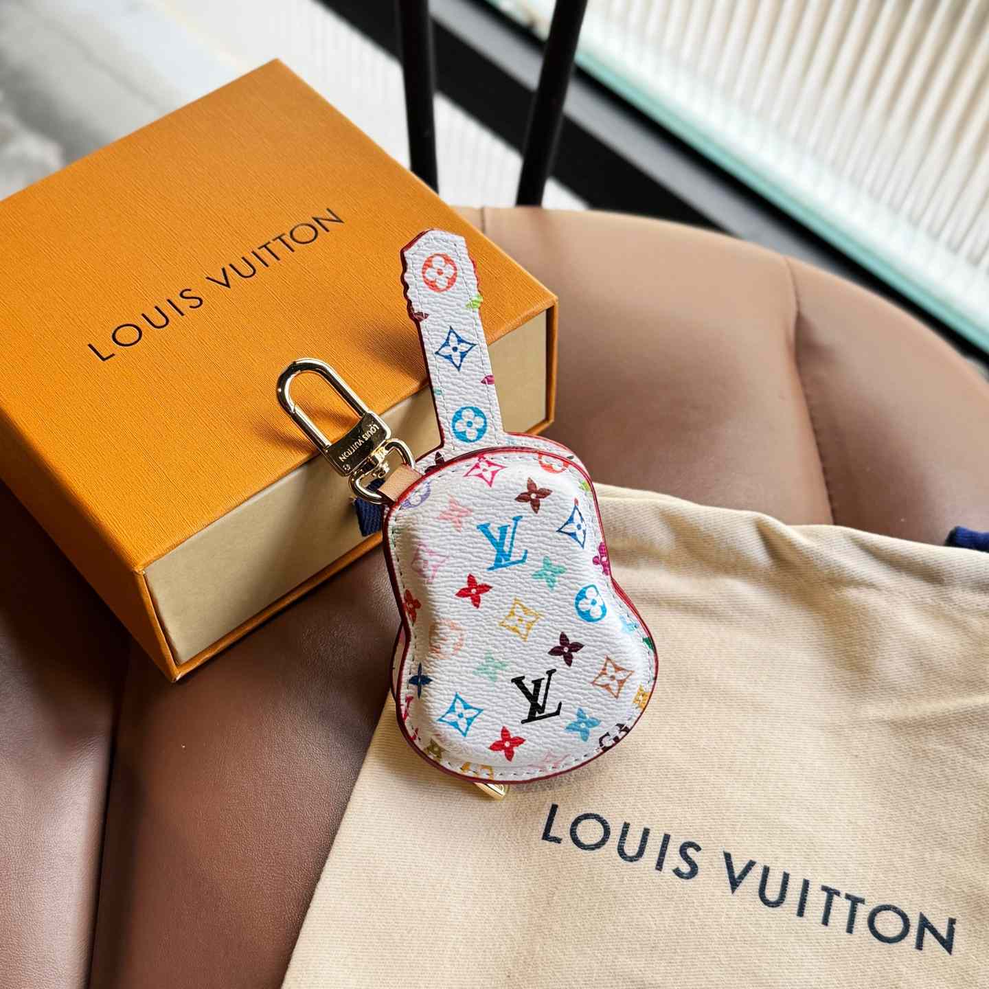 Louis Vuitton Guitar Pouch Bag Charm   M02032 - DesignerGu