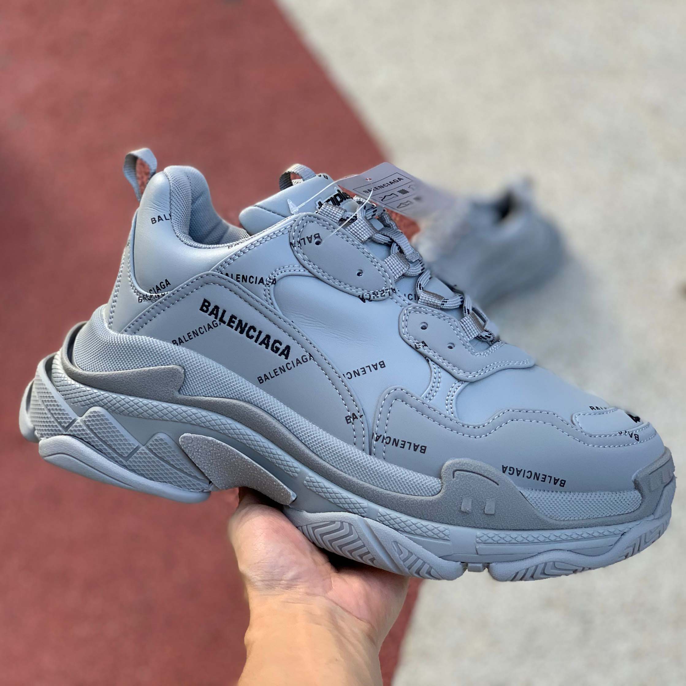 Balenciaga Allover Logo Triple S Sneaker - DesignerGu