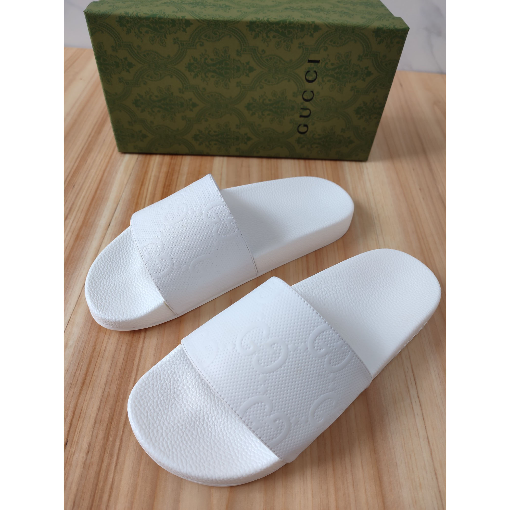 Gucci Logo Rubber Slide Sandal In White - DesignerGu