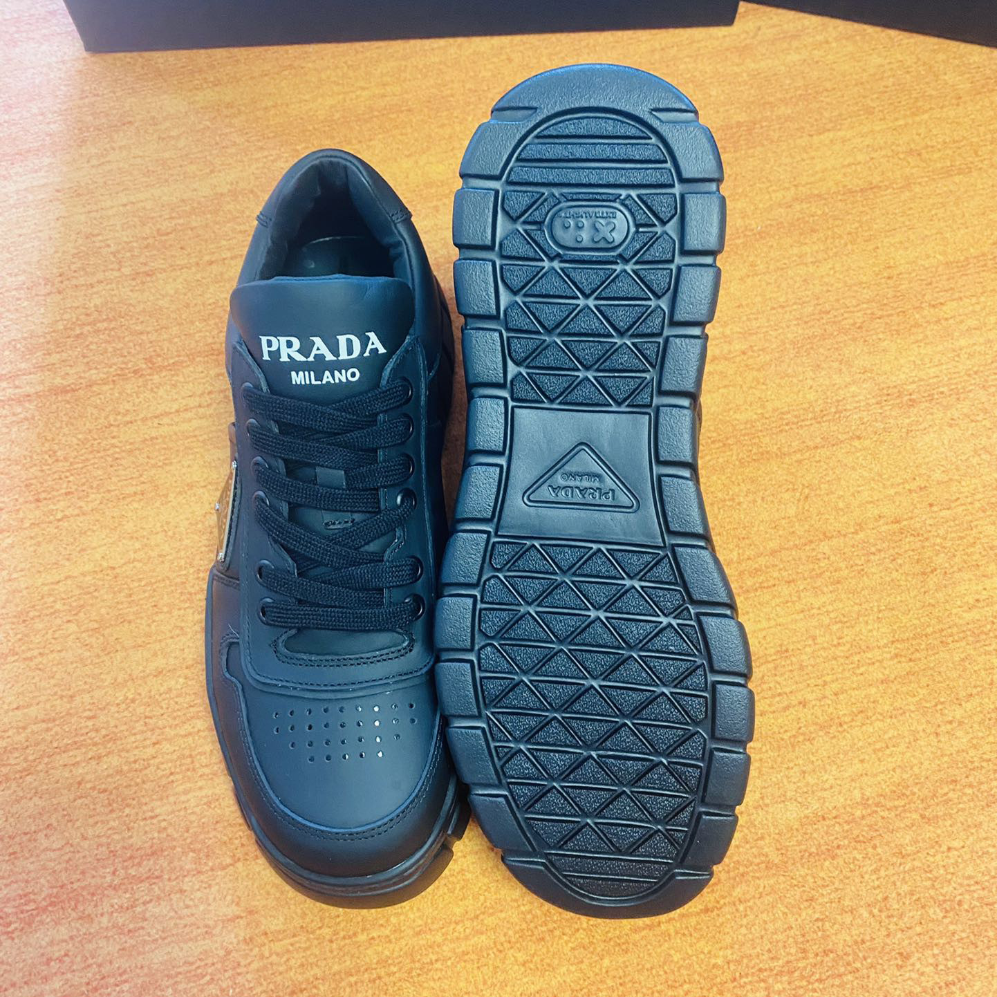 Prada Leather Sneakers - DesignerGu