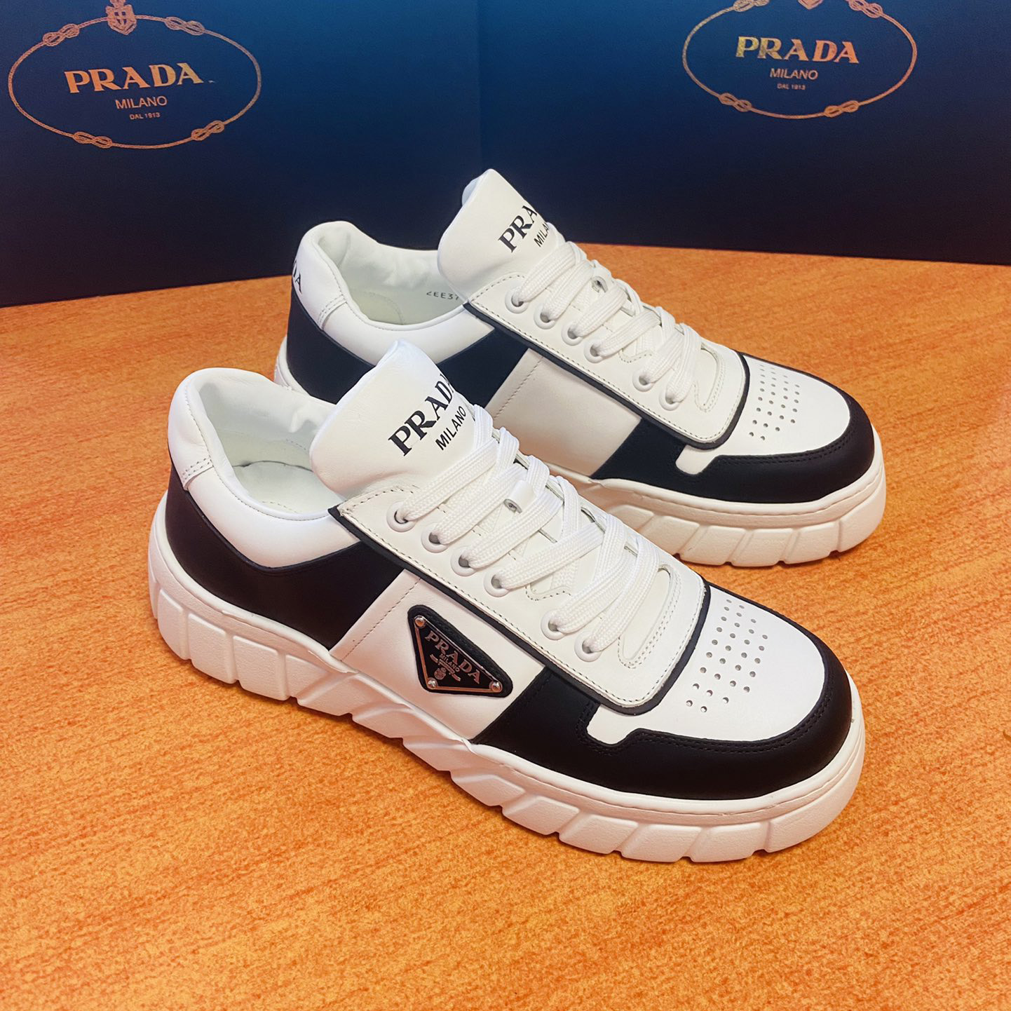 Prada Leather Sneakers - DesignerGu