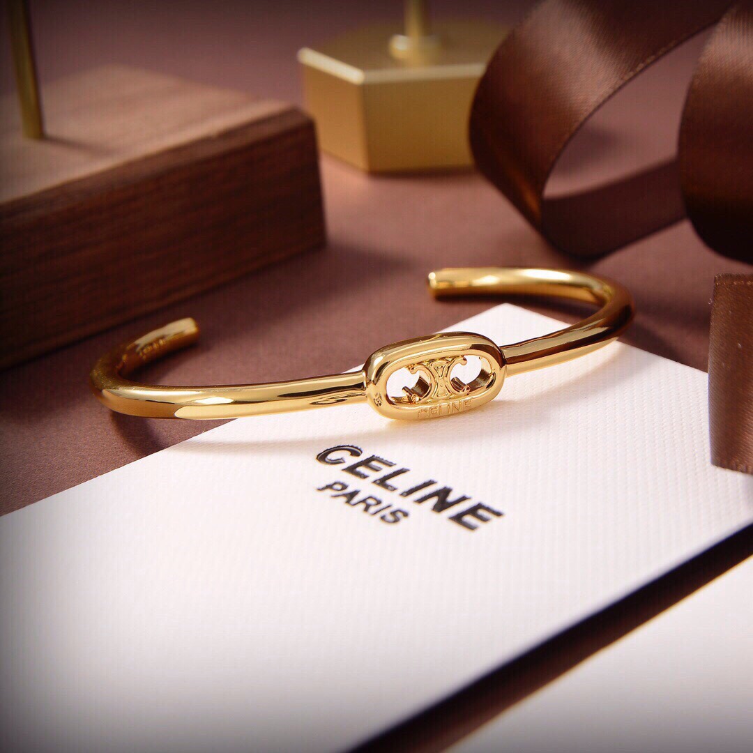 Celine Maillon Triomphe Thin Cuff In Brass With Gold Finish - DesignerGu