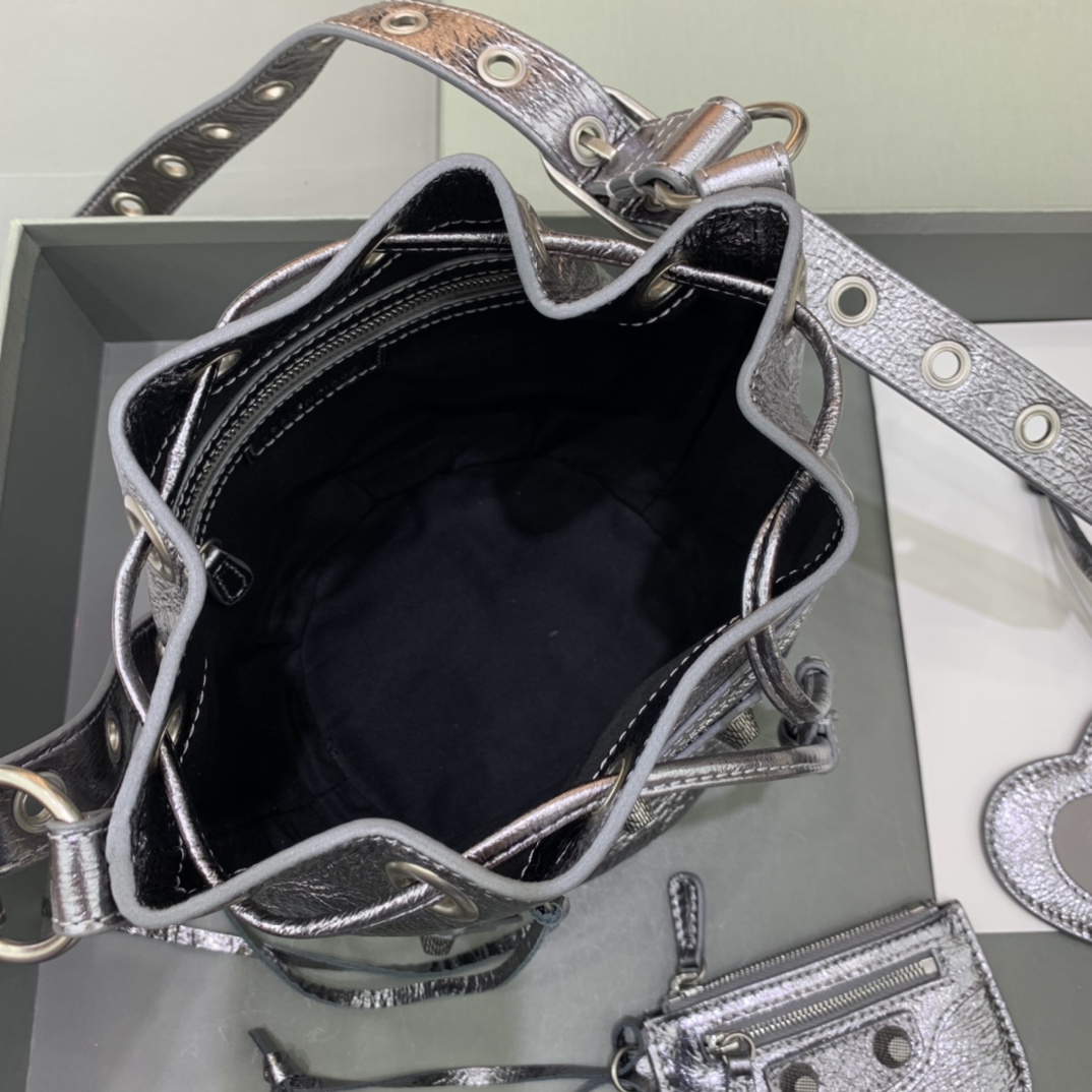 Balenciaga Le Cagole XS Bucket Bag In Silver Metallized Arena Lambskin, Aged-Silver Hardware With White Rhinestones(15-19.8-17.8cm) - DesignerGu