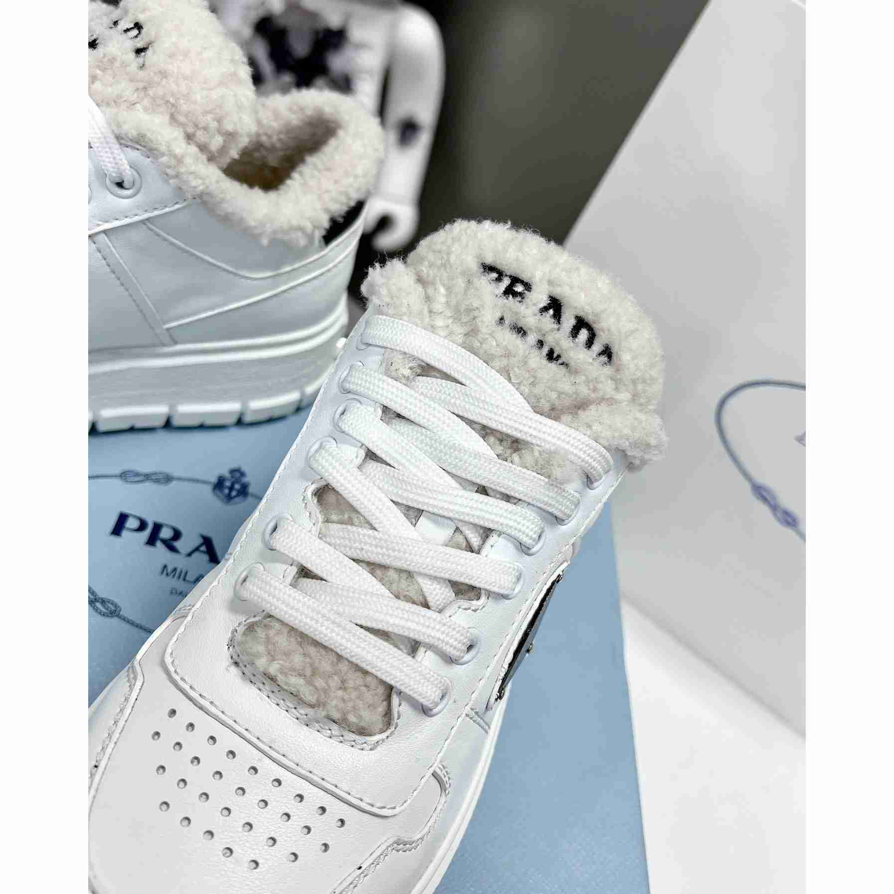 Prada Leather And Shearling Sneakers - DesignerGu