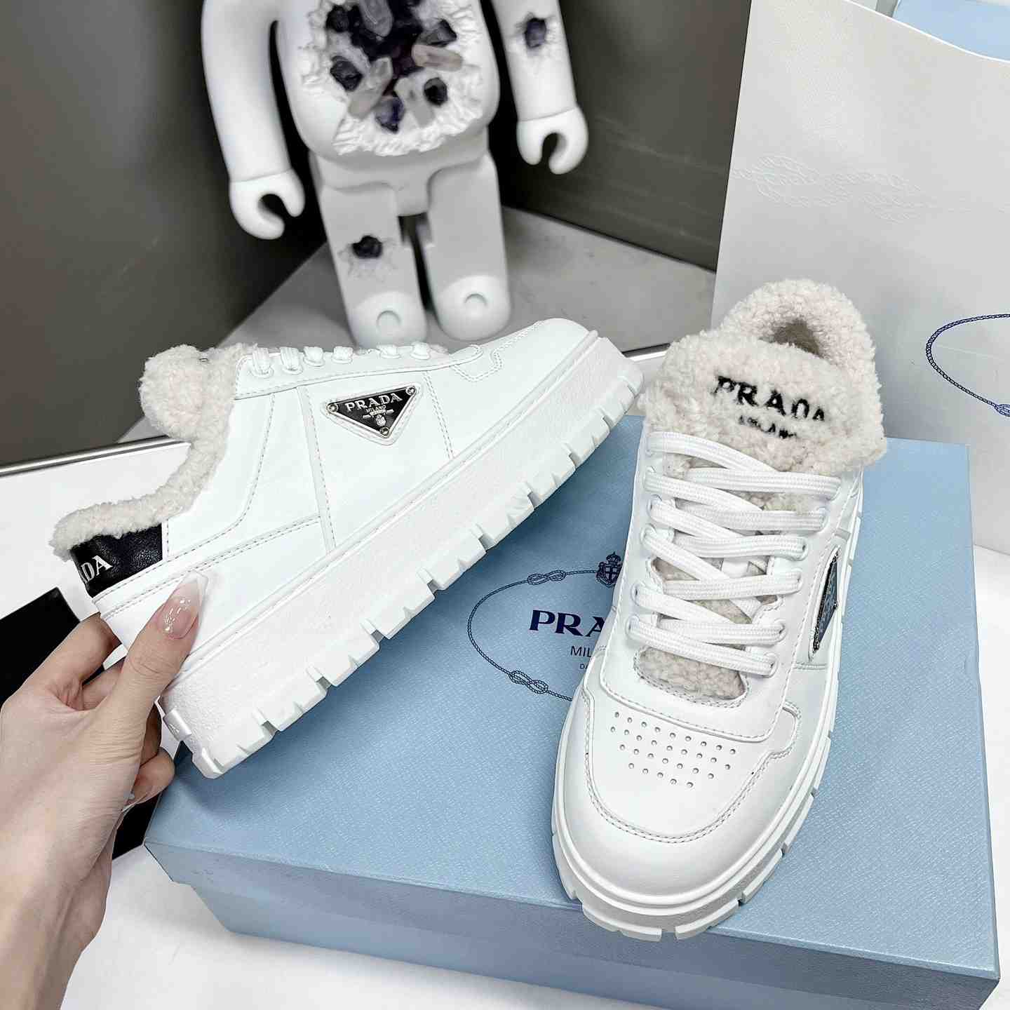 Prada Leather And Shearling Sneakers - DesignerGu