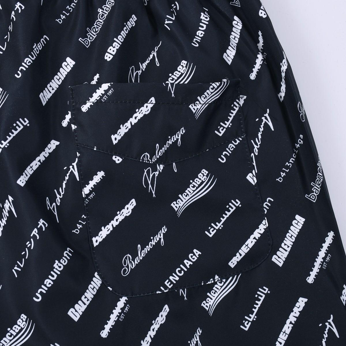 Balenciaga All-Over Logo Trousers - DesignerGu