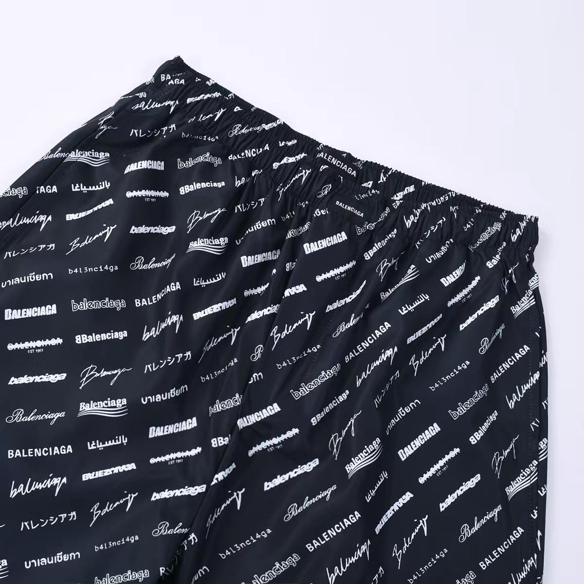 Balenciaga All-Over Logo Trousers - DesignerGu