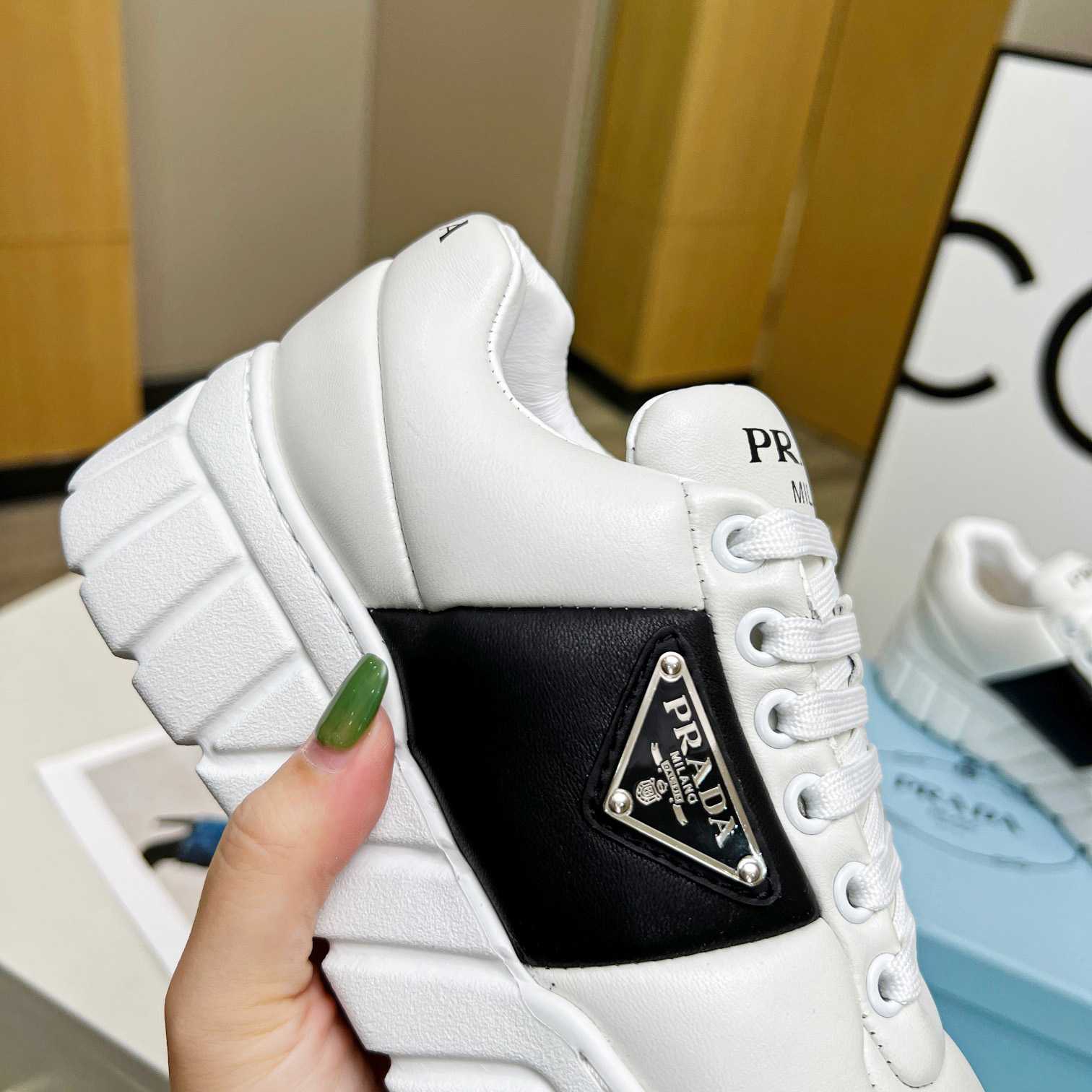 Prada Padded Nappa Leather Sneakers - DesignerGu